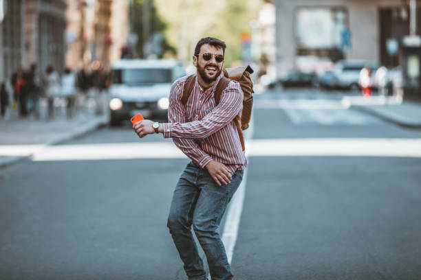 istock Young Man Walking on the City Road 1144375865