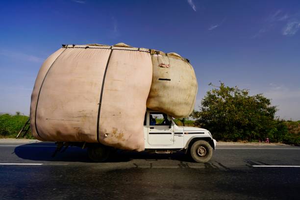 Jodhpur, Rajasthan, India - 22 March 2019: A truck with full loading moving on road.