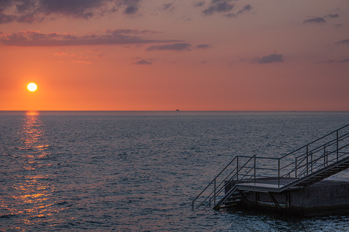 A sunset in the southern most part of Sweden. In the city of Helsingborg. This is the view to open water, to the left, not visible in this photo is Denmark.