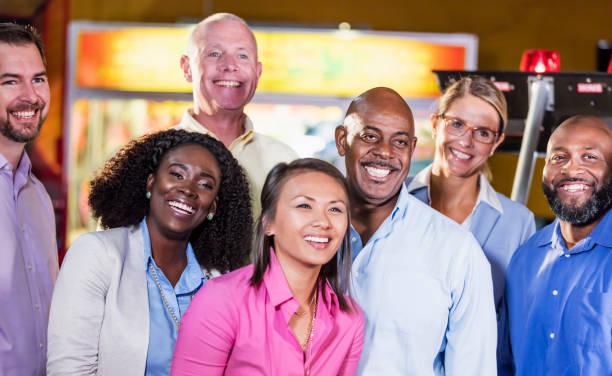 istock Corporate team building at amusement arcade 1144378504