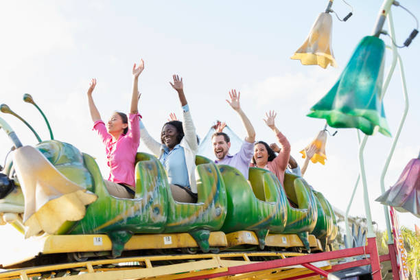 istock Corporate team building on amusement park rollercoaster 1144378644