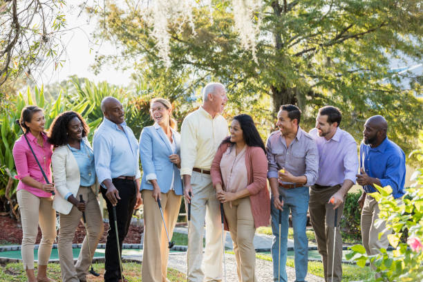 istock Corporate team building, playing miniature golf 1144378648