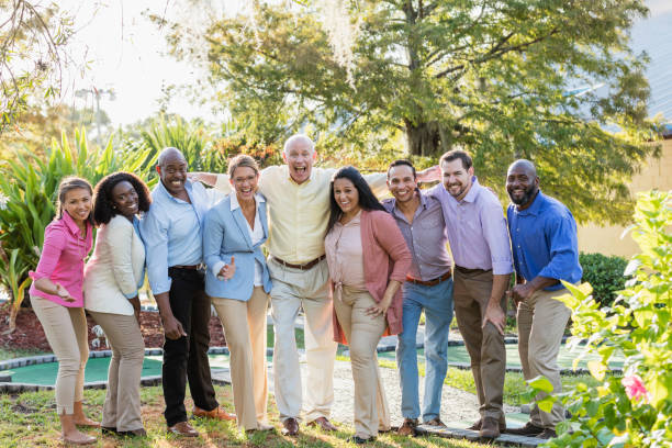 istock Corporate team building, playing miniature golf 1144378856