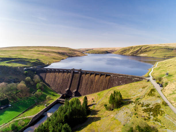 Aerial view of Claerwen Reservoir Aerial view of Claerwen Reservoir and dam, in the Elan Valley, mid Wales, Spring 2019 reservoir photos stock pictures, royalty-free photos & images