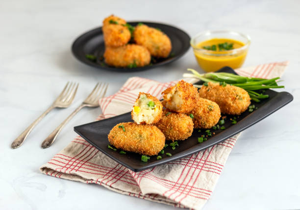 istock Potato Croquettes with Cheese Served with Mustard Sauce 1144382190