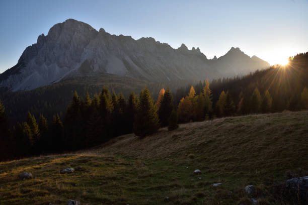 istock Autumn colors in dolomites mountains, sunset light, Italy 1144382704