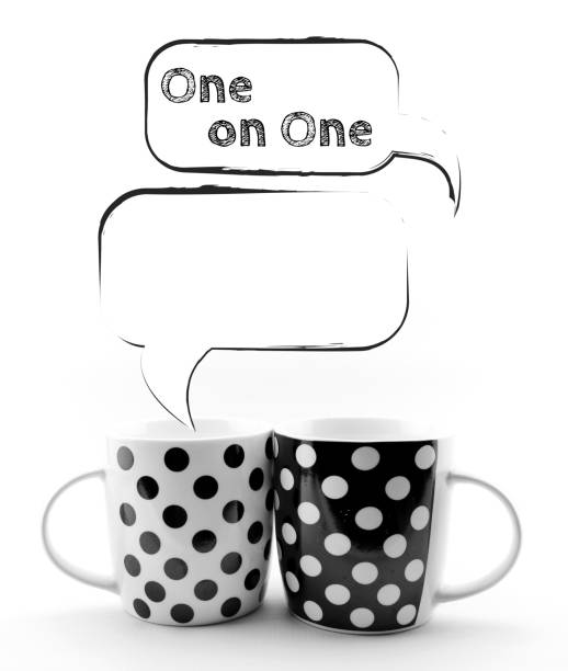 Black and white polka dots mugs isolated on white background