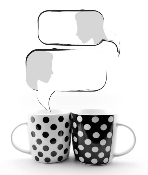 istock Black and white polka dots mugs isolated on white background 1144382860