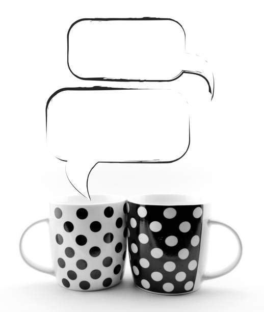 istock Black and white polka dots mugs isolated on white background 1144382869
