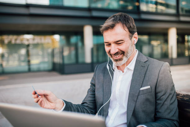 istock Business man looking at laptop 1144383325