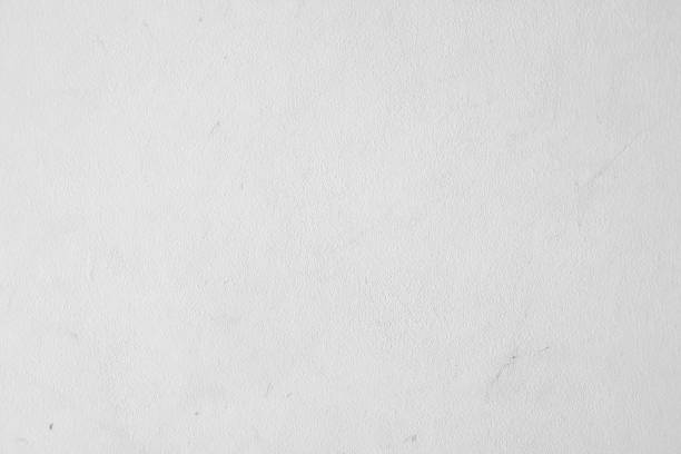 istock close up plain white color  cement wall background texture for show or advertise or promote product and content on display and web design element concept 1144383918