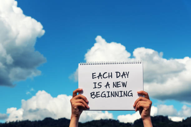 istock Inspirational quotes - Each day is a new beginning 1144384084