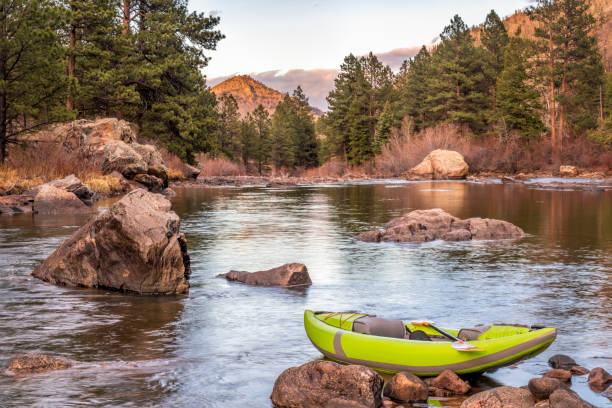 istock inflatable whitewater kayak on a mountain river 1144384420