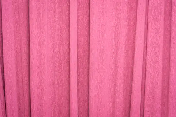 pink crepe paper - background with crinkled texture