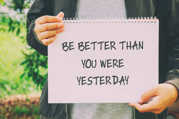 istock Inspirational quotes - Be better than you were yesterday 1144385633
