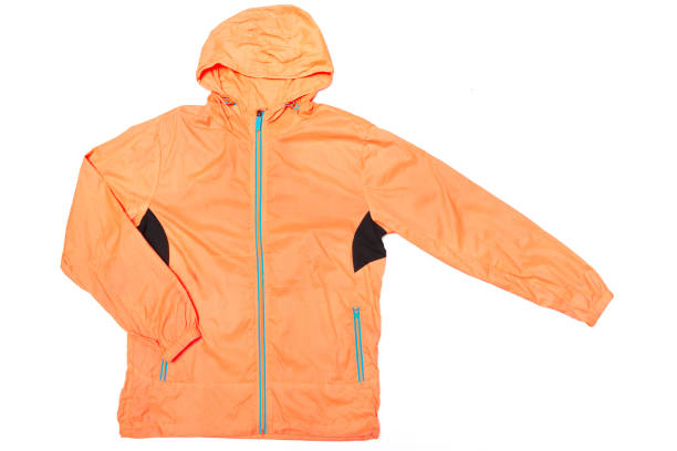 istock yellow-orange windbreaker jacket 1144386348