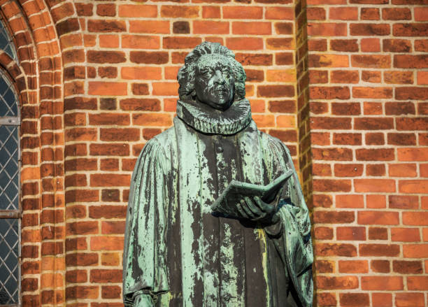 Statue of the famous Danish 18th century psalmist Hans Adolph Brorson, Ribe, Denmark.Ribe Cathedral is a romanesque church from 1150 AD onwards and inagurated in 1250. Ribe is the oldest town i Denmark founded 704-710 AD and located on the west coast of Jutland.