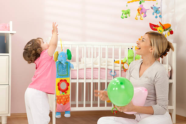 istock Mother Playing With Her Baby Girl 114438938