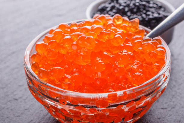 istock red and black caviar in a bowl on a dark stone background 1144390850