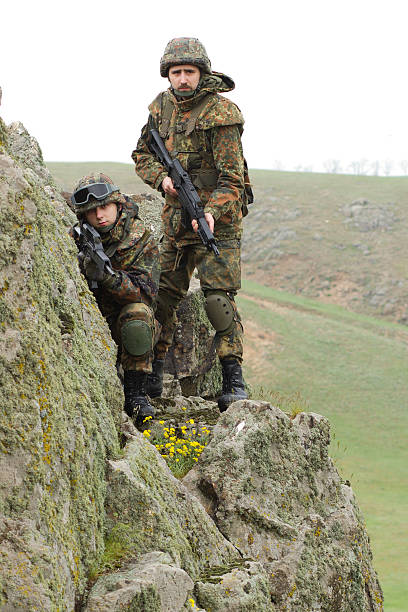 istock Soldiers on the rock 114439159