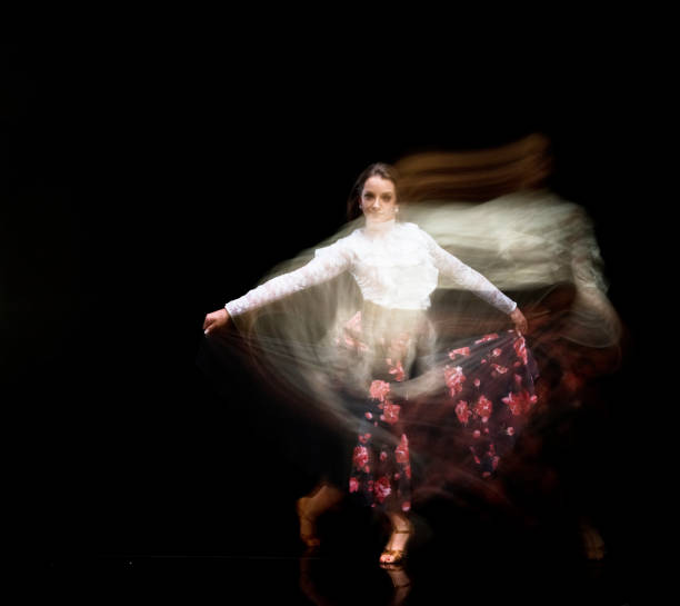 istock Beautiful female ballroom dancing - motion blur 1144392598