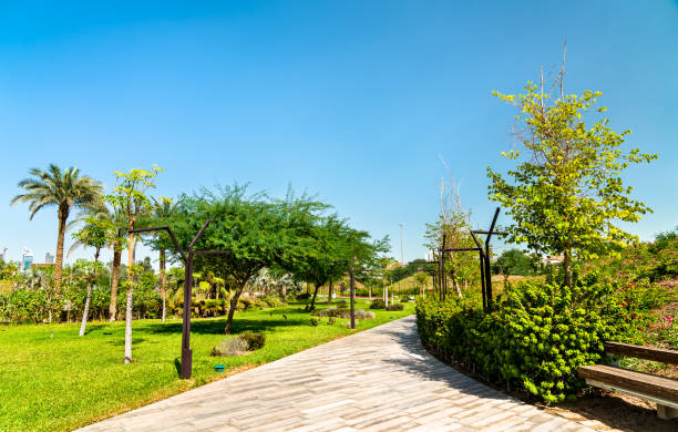 istock Footpath in Al Shaheed Park, Kuwait City 1144392874