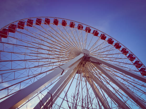 istock Ferris wheel on blue sky 1144393006