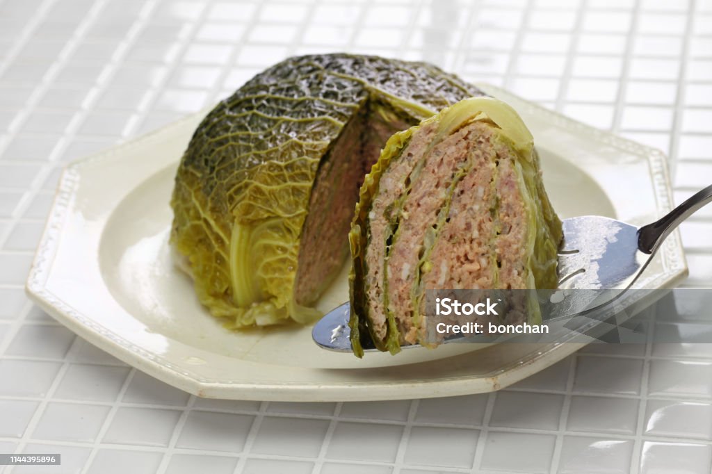 chou farci, stuffed cabbage chou farci, stuffed cabbage, traditional french cuisine Stuffed Cabbage Stock Photo