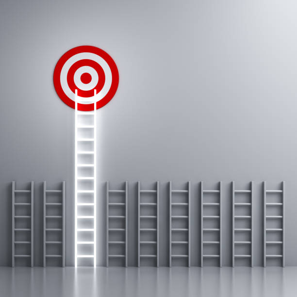 istock Stand out from the crowd and different creative idea concepts Longest neon light ladder glowing and aiming high to goal target among other short ladders on grey  background with shadows 1144397634
