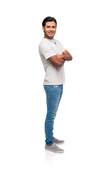 istock Latin male with arms crossed and standing 1144400016