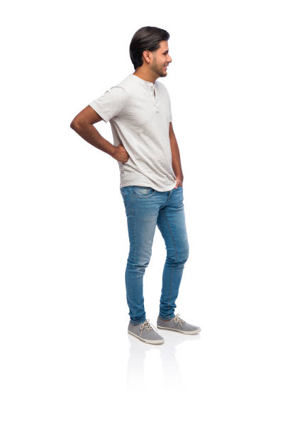 istock Side view of a young latin male standing 1144400025