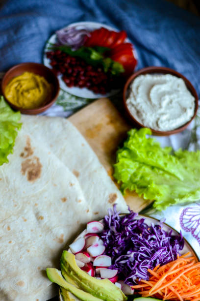 istock layout of ingredients for vegetable roll on dark background 1144402374