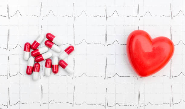 istock Pills with red heart on the cardiogram. 1144402918