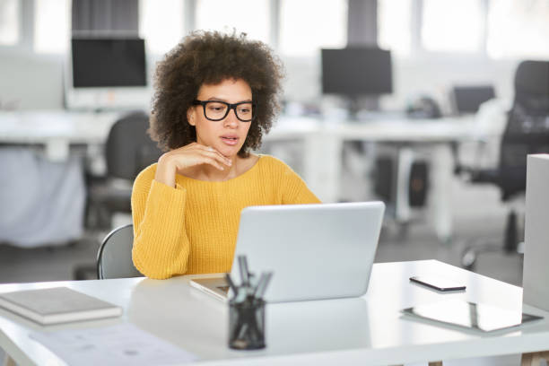 istock Serious businesswoman using laptop. 1144405375