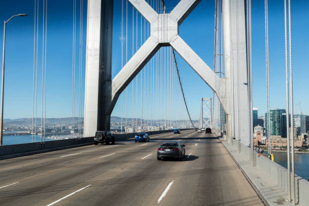 traffico a san francisco-oakland bay bridge, california - bay bridge car traffic transportation foto e immagini stock