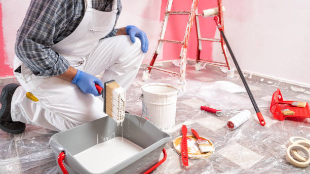 istock House painter worker at work in the construction site. Building. 1144407558