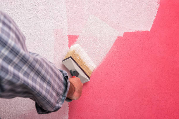 istock House painter worker at work in the construction site. Building. 1144407581