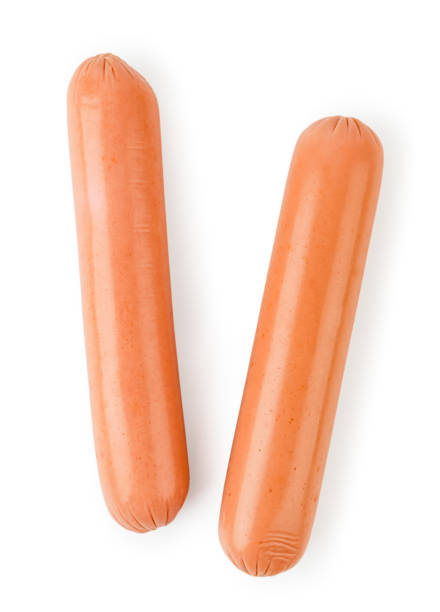 istock Two sausages on a white. The form of the top. 1144407968