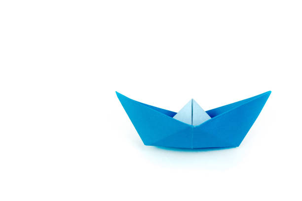 istock Origami White Paper Boat Isolated on White Background. 1144409113