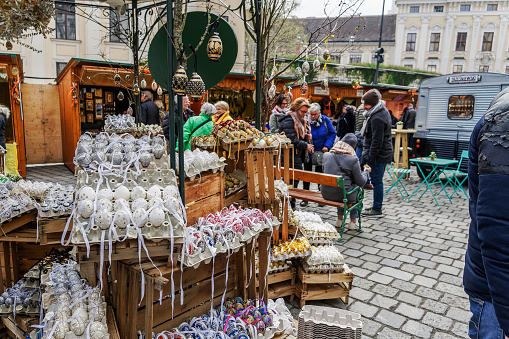 Vienna, Austria - April 14 2019: Easter Market Altwiener Freyung Ostermarkt. Wien, Osterreich street market, where local vendors from Austrian regions sell decorative Easter eggs, food & drinks.
