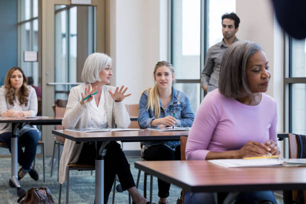 istock Group of people attend high school orientation 1144410717