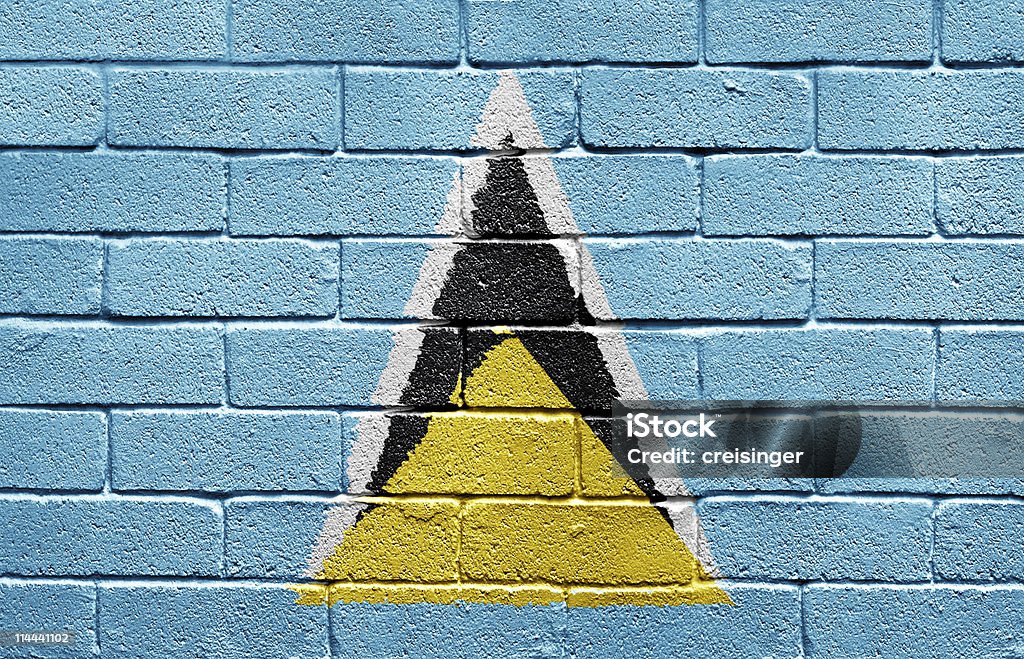 Flag of Saint Lucia on brick wall  Brick Wall Stock Photo