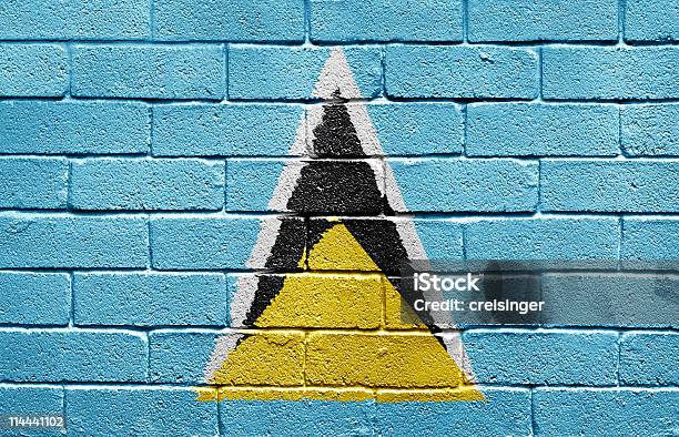 Flag Of Saint Lucia On Brick Wall Stock Photo - Download Image Now - Brick Wall, Color Image, Flag
