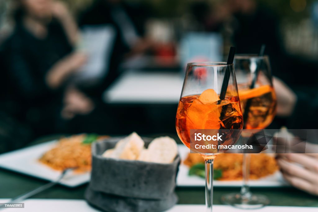 Spritz cocktails on branch table Cocktail Stock Photo