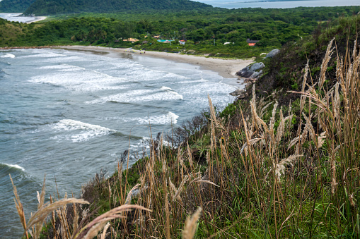 View from the lighthouse hilltop of Praia de Fora, a beach on the island of Ilha do Mel, Brazil.