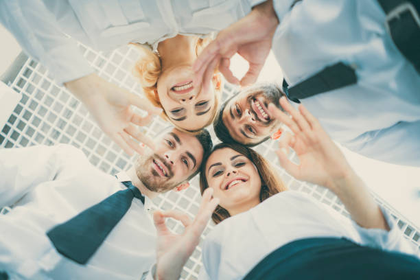 istock The four people gesture to the camera 1144418343