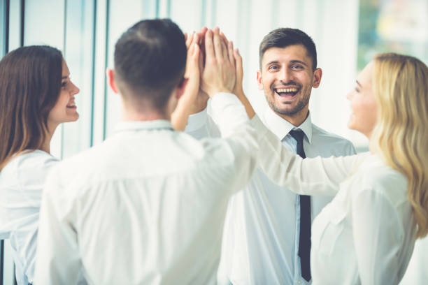 istock The happy business people greeting with a high five 1144419051