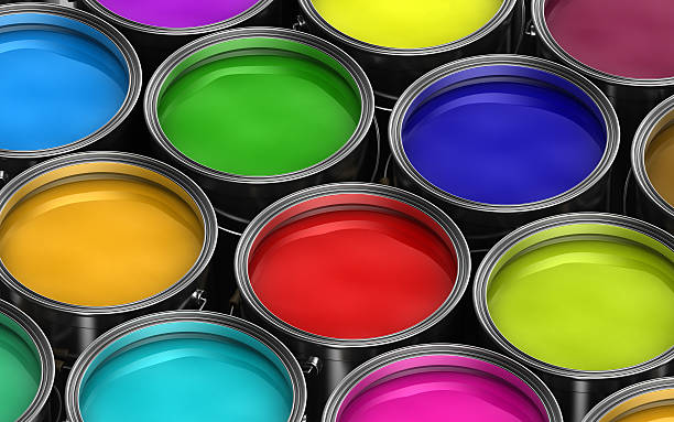 Colorful paint buckets stock photo