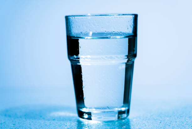 istock Water to drink poured into a glass 1144424892
