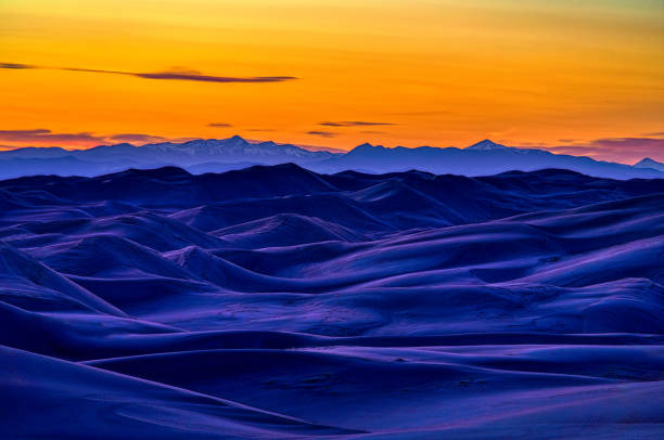 Great Sand Dunes Colorado - Large scenic dunes mountain landscape. Great Sand Dunes National Park, Colorado USA.